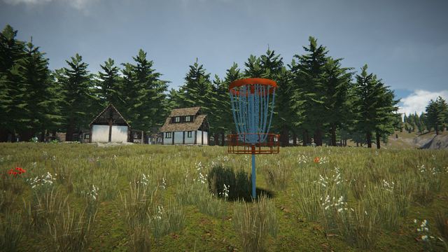 Basket in a meadow near the cottages